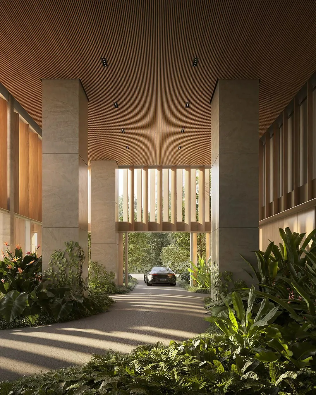 A timber-lined arrival court opening onto landscaped gardens