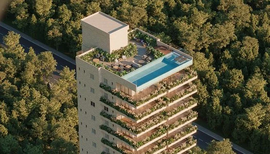 Aerial view of a Zoyaa tower and its rooftop pool